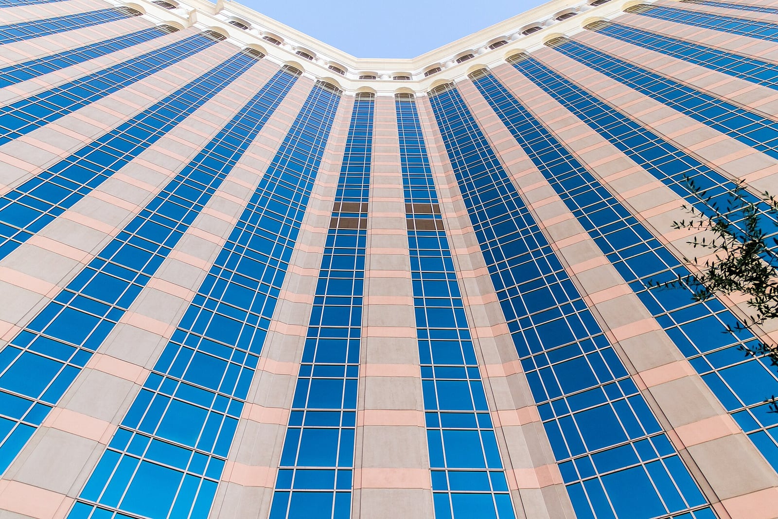 Blue and cream towers of The Venetian Resort rising above the Las Vegas Strip